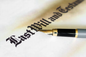 Picture of a will with a pen on top of it.